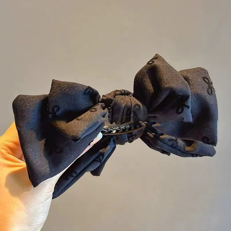 š„New Hot Sellingā¤ļøāš„ Grey double-bow hair clip